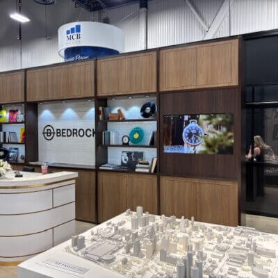 lots of images of an ICSC tradeshow booth